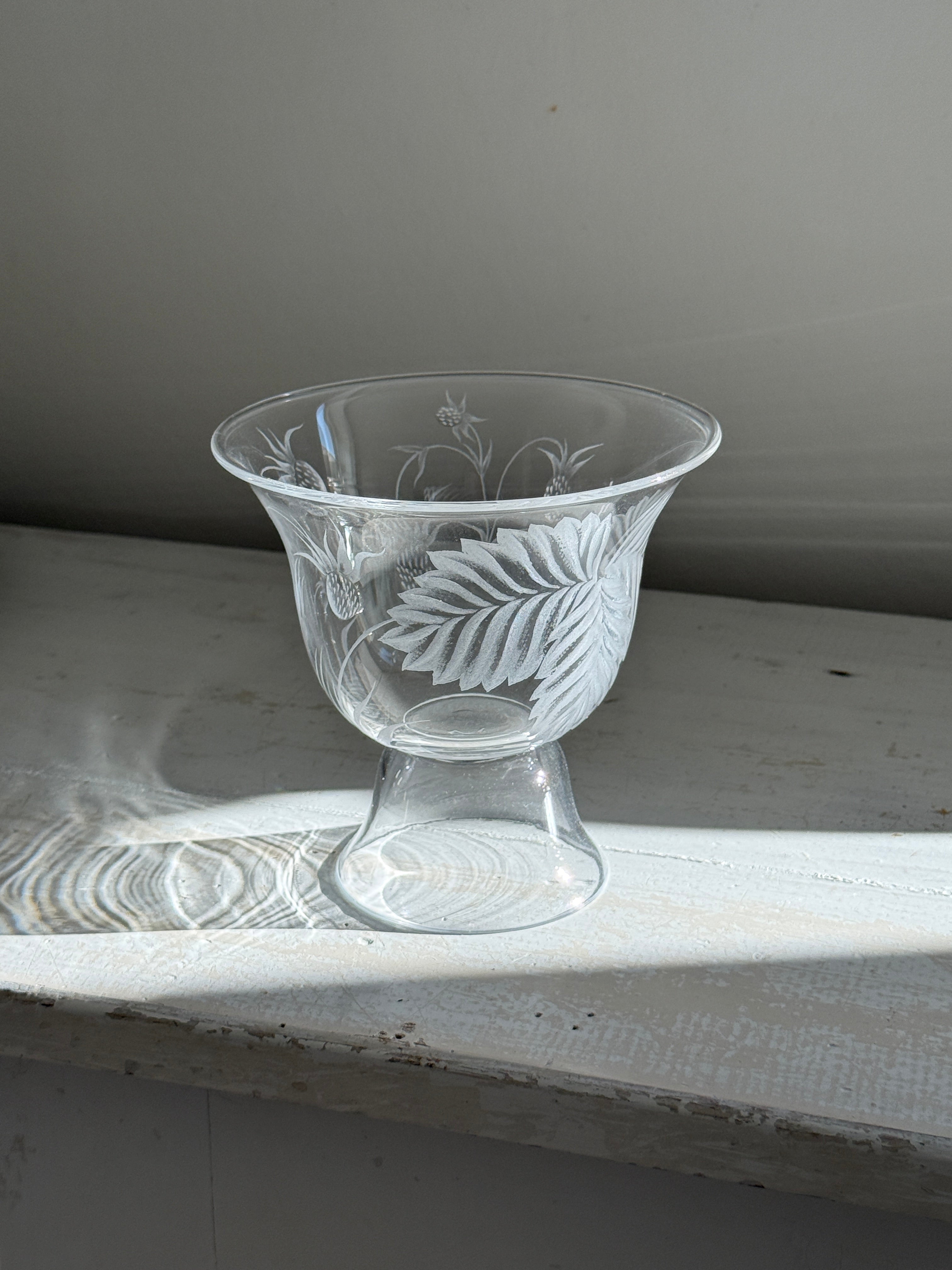 Footed glass vase